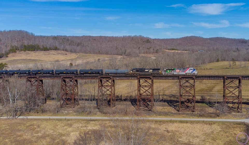 Freight train crossing Kentucky bridge