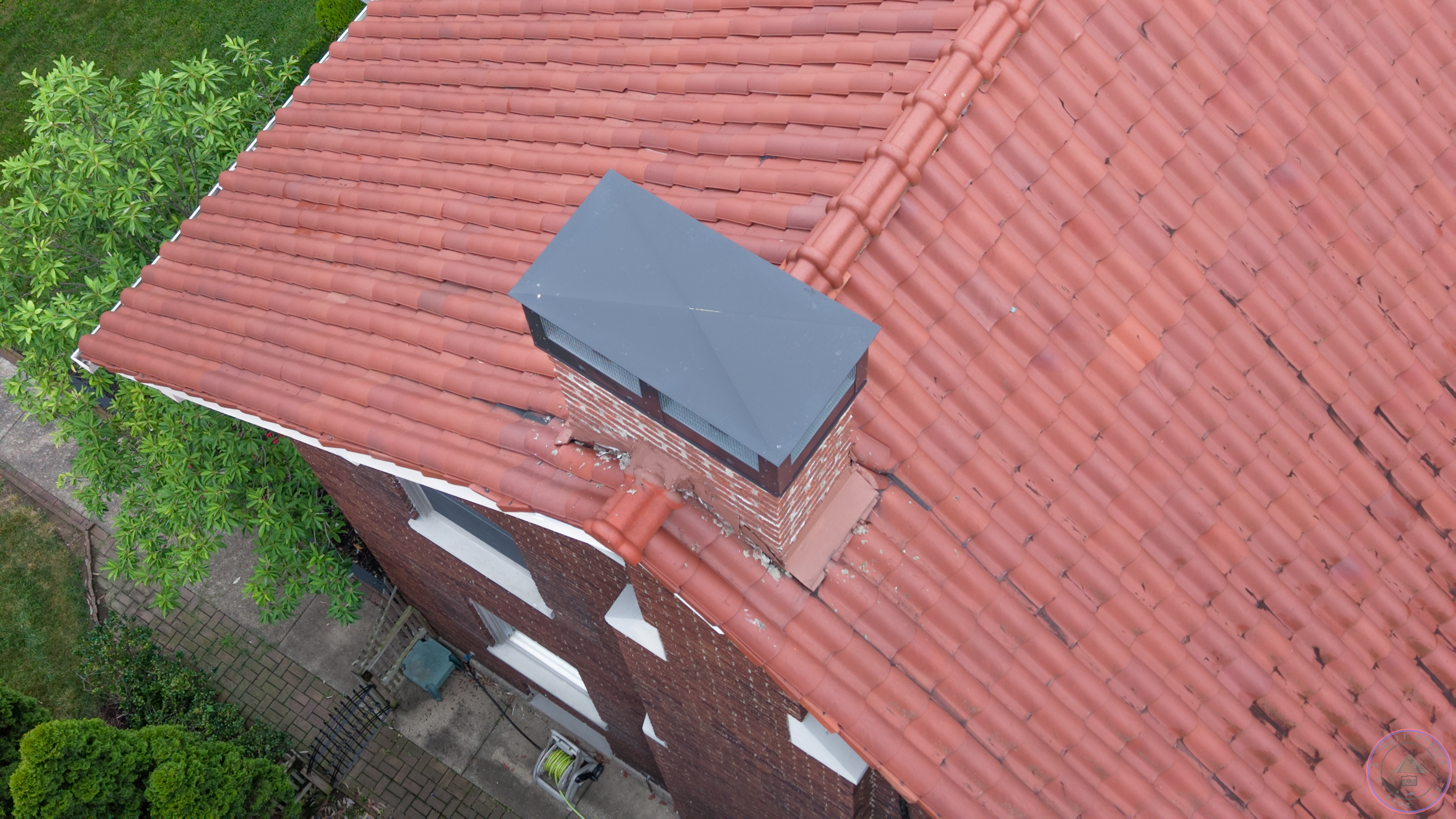 Chimney flashing and mortar damage from above